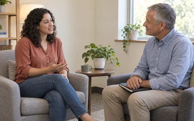 Woman speaking with a mental health professional during an assessment in a welcoming counseling room.